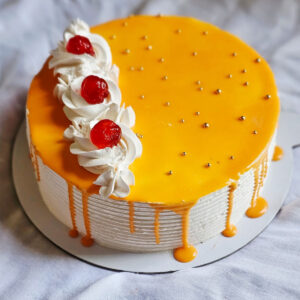 Orange Cake with Red Cherries